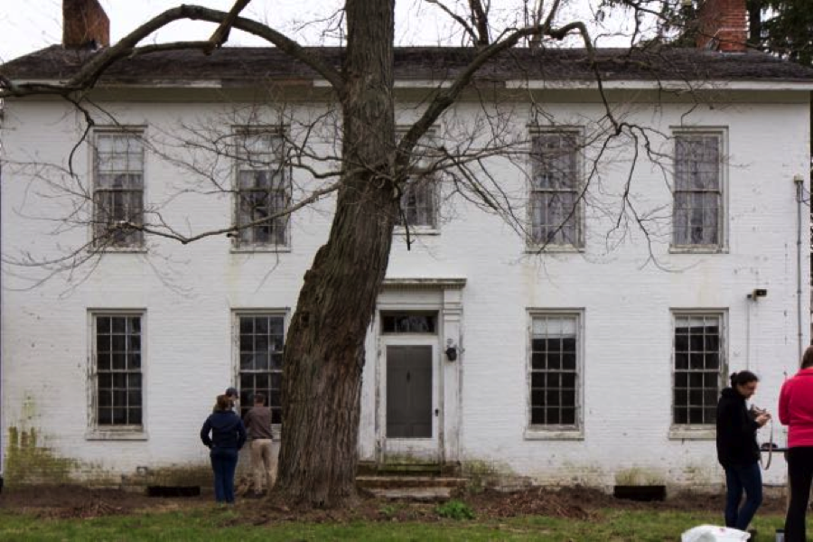 Students examine building details and prepare drawings of the west side of the 1841 Austin-Magie farmhouse.