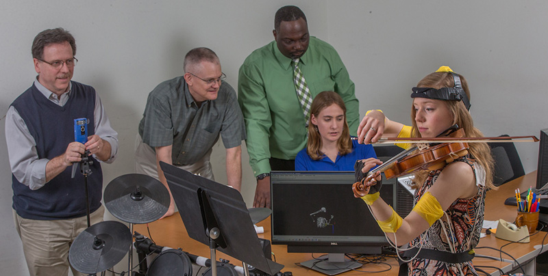 Three professors from different disciplines come together to study music, movement and pain.