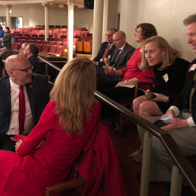 The Crawfords chat with seatmates during intermission
