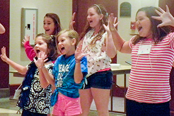Students rehearsing for Snow White
