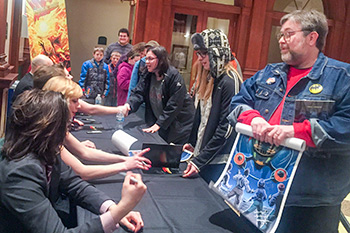 Autograph line after performance of Interalactic Nemesis
