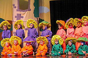 Children in costume performing Rapunzel