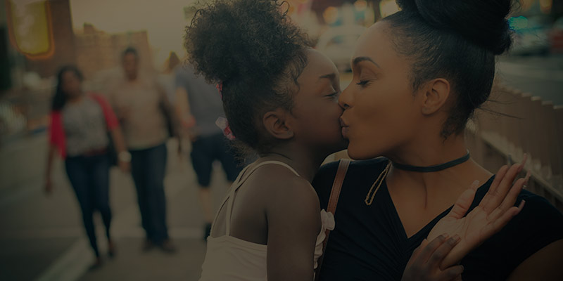 a woman holding her child