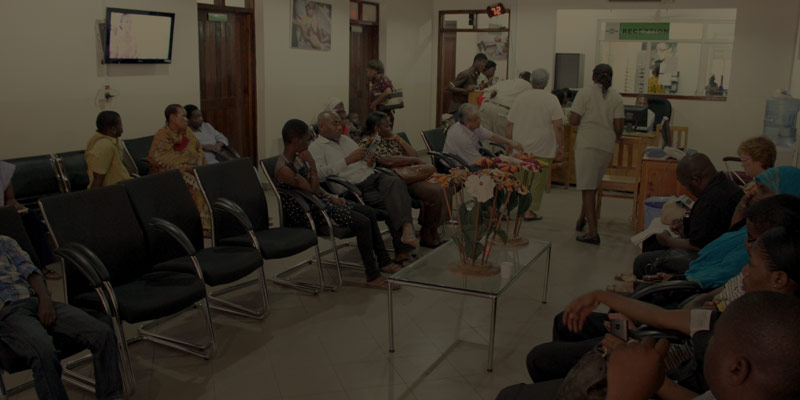 people waiting in a hospital waiting room