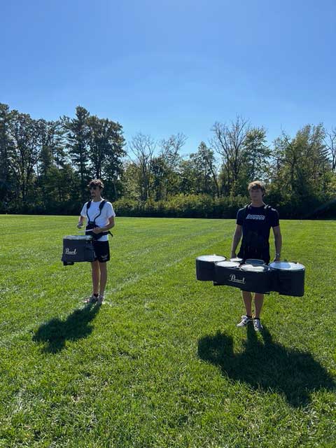 Nate Koenes and Sam Eifert demonstrating proper technique on snare drum and tenors.