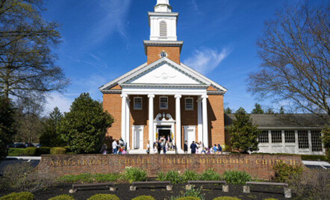 Image of a white siding and red brick