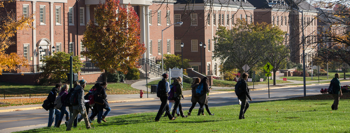 Students walking in front of Benton Hall