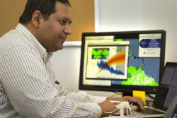 Dr. Rao showing mosquito model