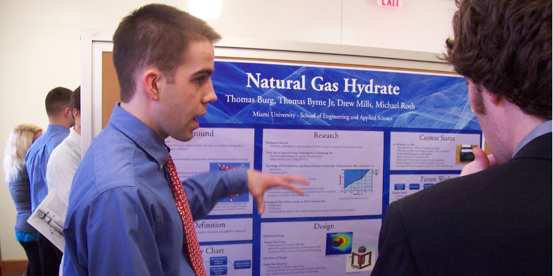 Student explaining his senior design project on Natural Gas Hydrate