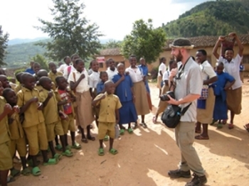 Colin entertaining children at the local school