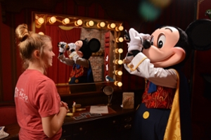 Amelia McIe interacts with Mickey Mouse
