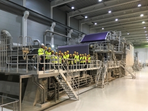 Students at a paper mill