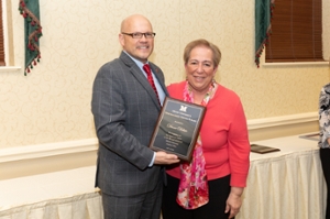 Diane Delisio accepting her Distinguished Service Award
