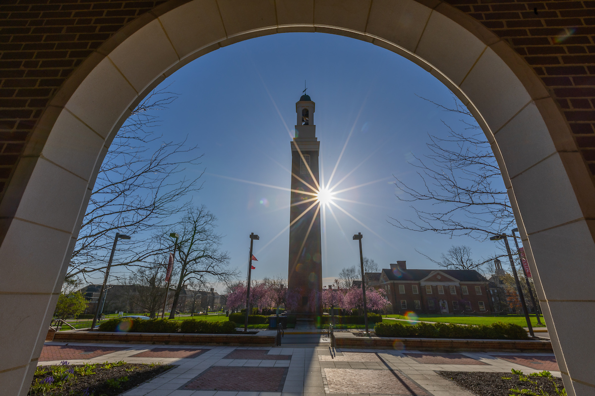 The Bell Tower as viewed through a brick arch.