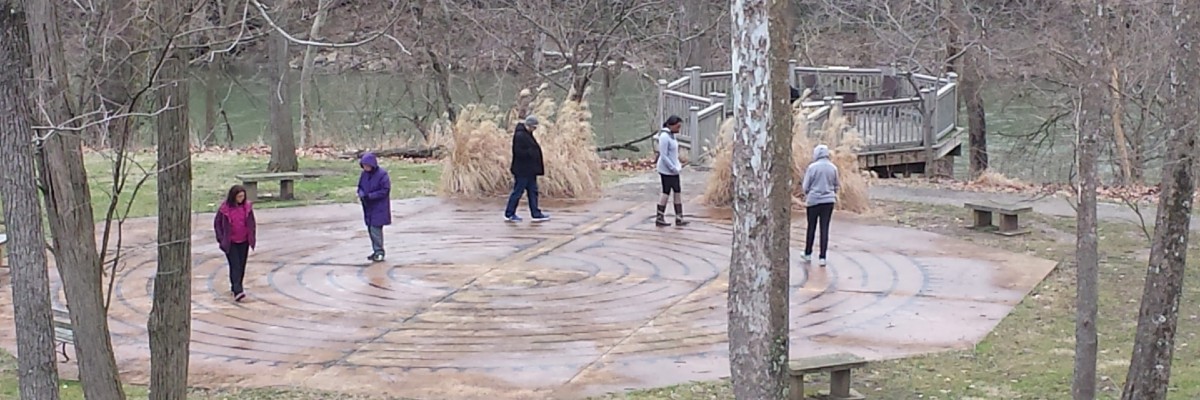 Faculty and staff walk a labyrinth during a Mindfulness and Contemplative Inquiry Faculty Learning Community retreat.