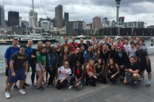 students take picture on dock