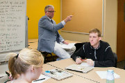 Teacher Education Professor Thomas Misco engages his students in a discussion