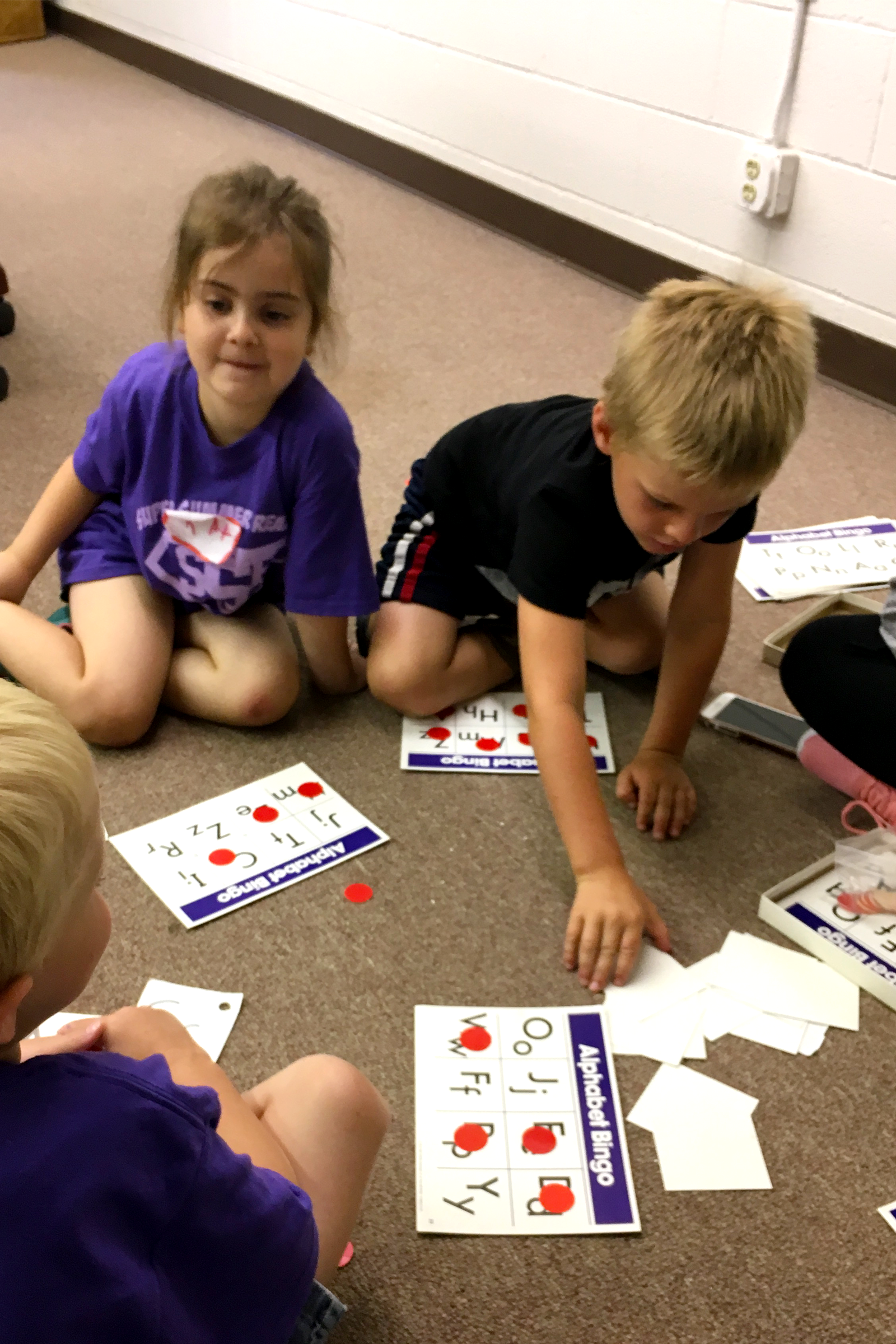 children doing a learning activity together