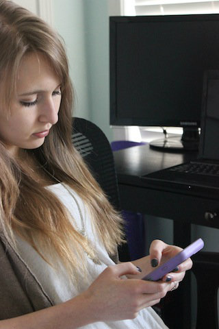 Student using her phone
