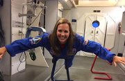 Miami graduate Jackie O'Brien poses for a picture in space suit
