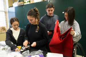 Group of Students Make Shoes