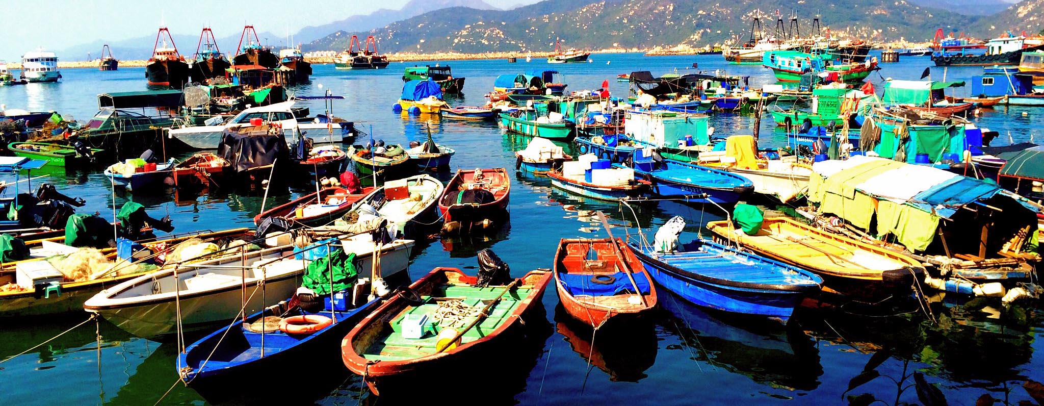  Colorful boats in an Asian harbor