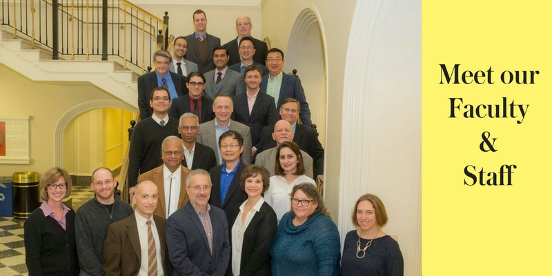 photo of isa staff and faculty on staircase