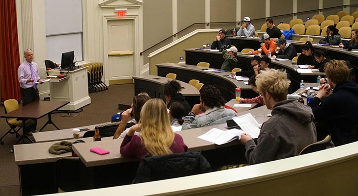 Terry Nixon teaches a winter term finance class in Taylor Auditorium