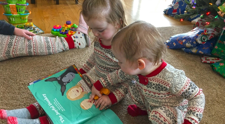 Two children reading a Keepsake Tales book
