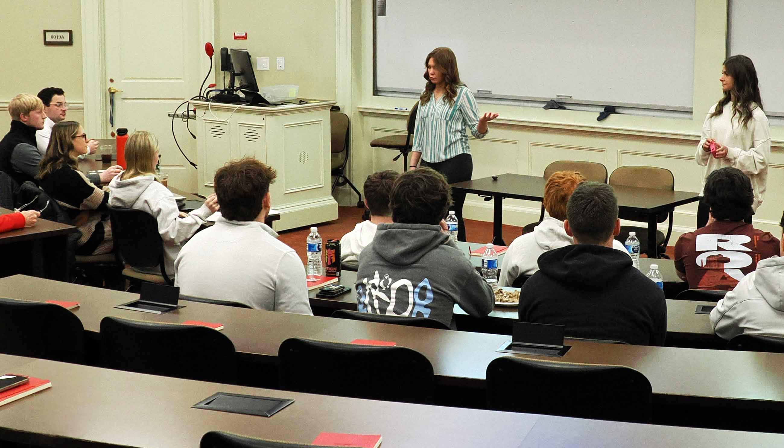 Students make a pitch before faculty and volunteer judges