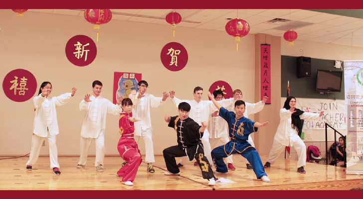 Confucius Institute members demonstrating dance traditions.