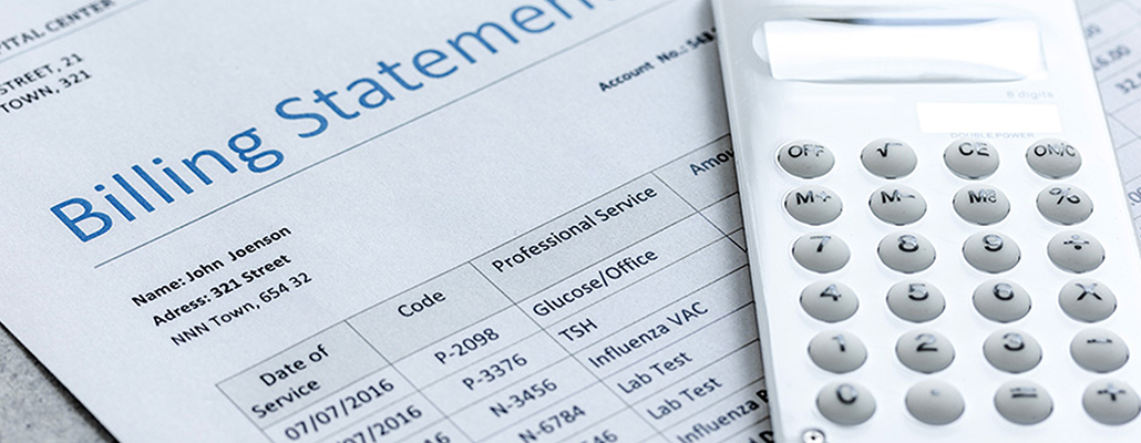 A medical bill and calculator