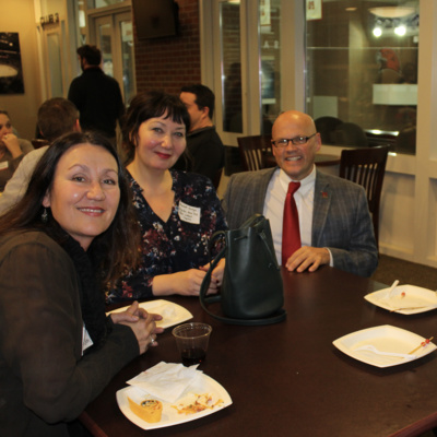 President Crawford dining with faculty 