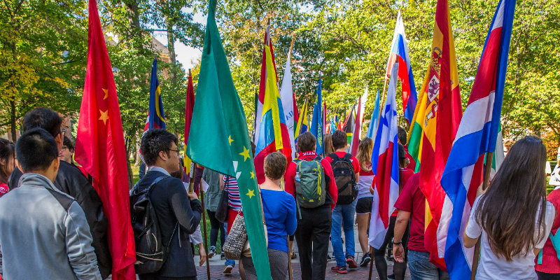 Representative international student parade carrying country flags