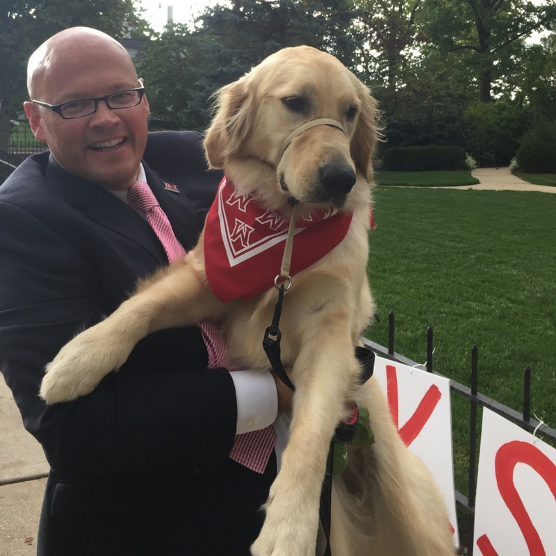 President Crawford with dog, Ivy