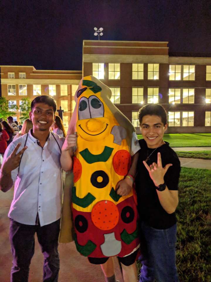 Francisco hanging out with friends at a campus event