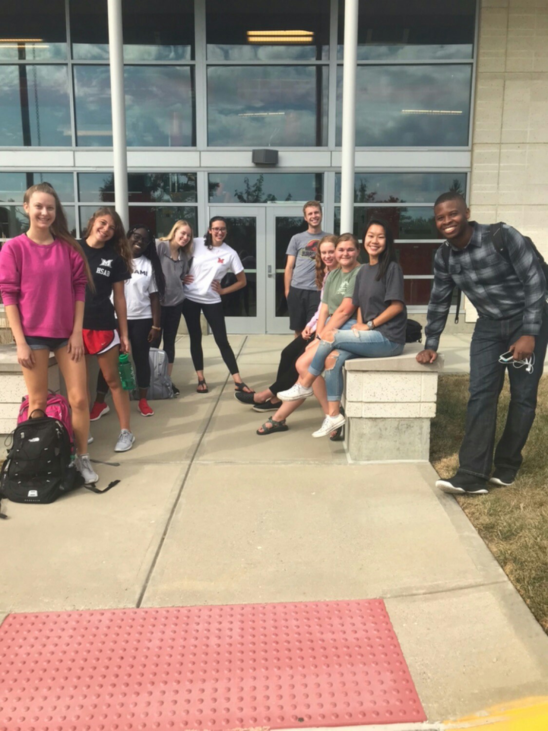 Jermaine and a group of students