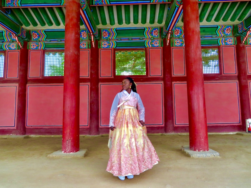 Sinait poses in traditional gown indoors