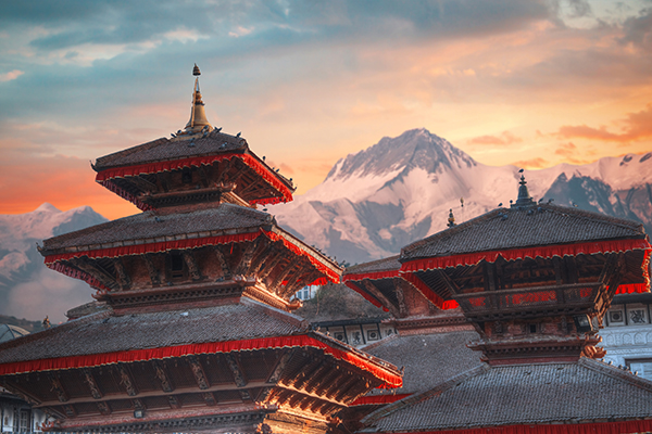 Nepalese tiered rooftops and mountains