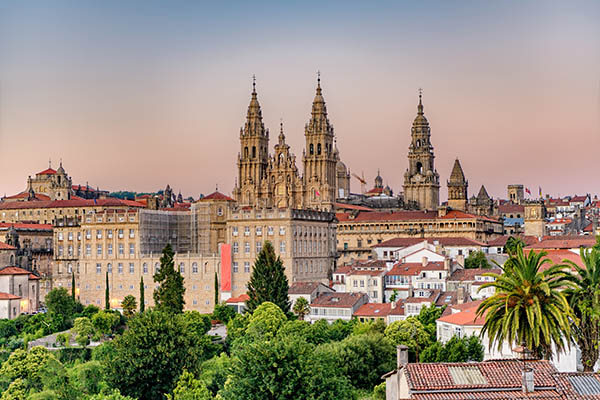 hazy sunset on santiago de compostela cathedral and city view