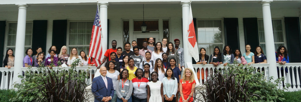  Group of new international graduate students in front of President Crawford's house with both Crawfords
