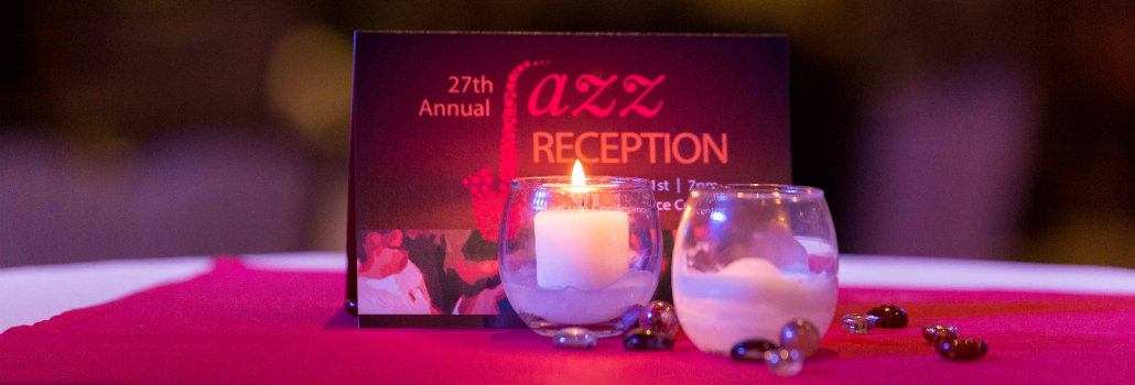 27th Jazz Reception Invitation sitting on a table