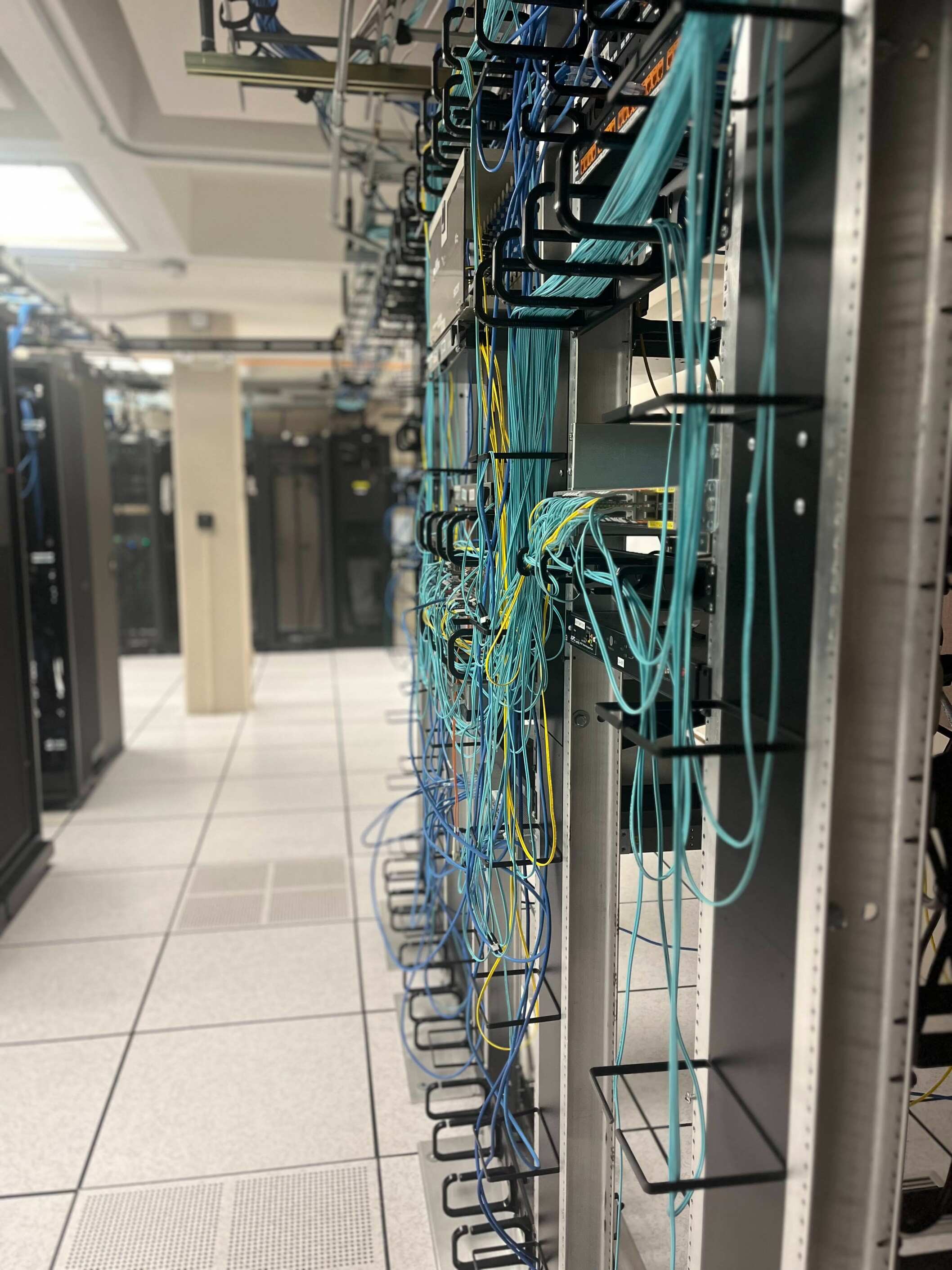 Blue networking wires in the Hoyt data center