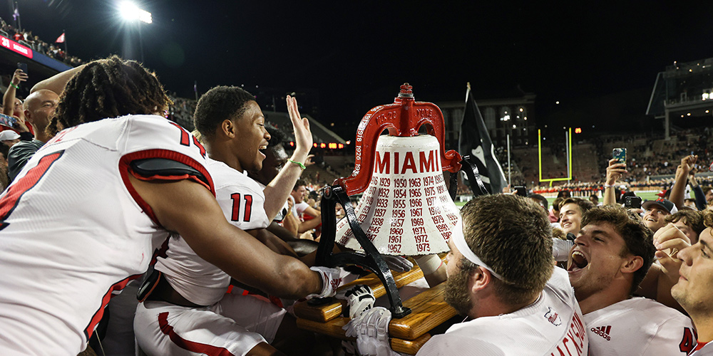 Football team reclaiming the bell from University of Cincinnati.