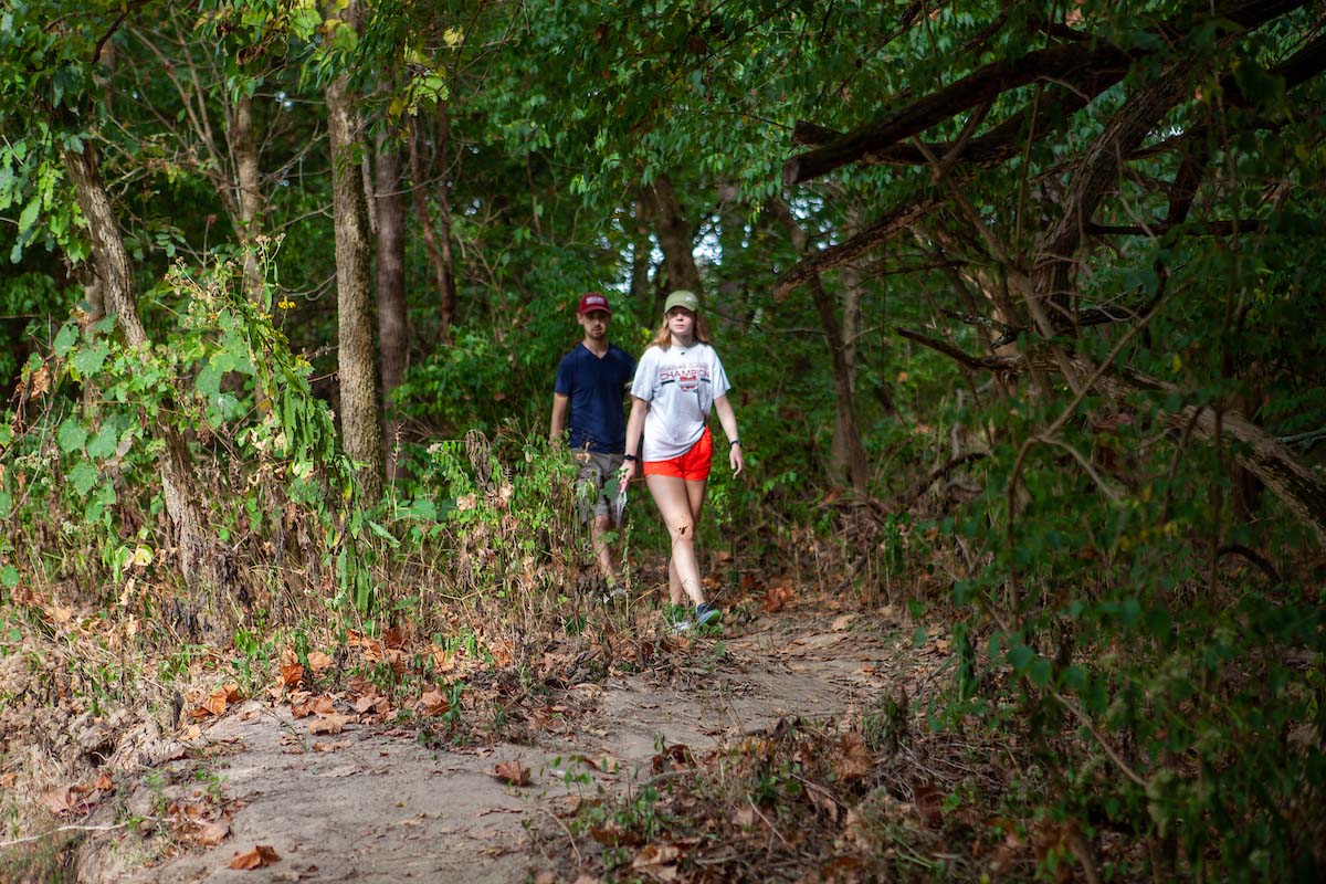 Two students embark on a trail in one of the many natural areas around Oxford, Ohio.