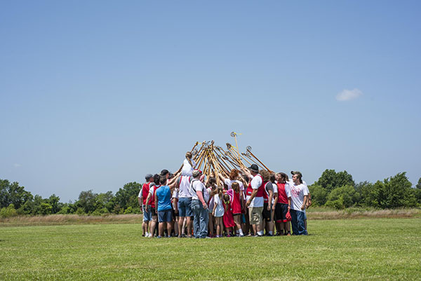 Myaamia community members of all ages kick off a lacrosse game in Miami, Oklahoma in 2019. Community peekitahaminki, ‘lacrosse,’ games are commonly played at community gatherings.