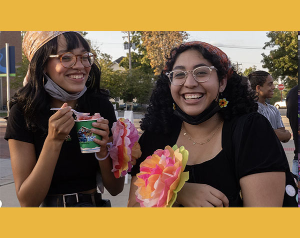 two women students enjoy the Unidiversity festival