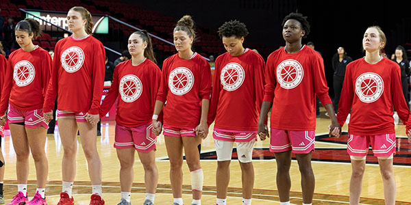 Miami University women's basketball players prepare for the start of their Love.Honor.Care game
