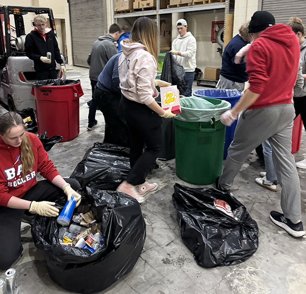 students sort waste