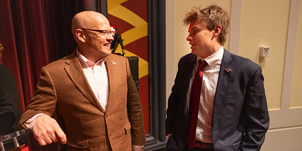 Miami University President Gregory Crawford talks with Will Brinley, president of Associated Student Government